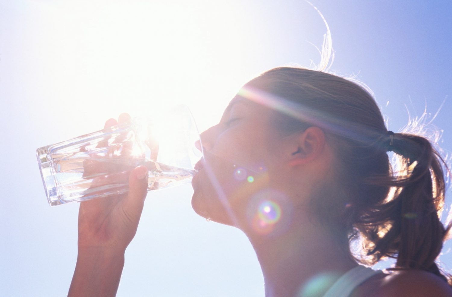 WOMAN DRINKING WATER, CLOSE UP