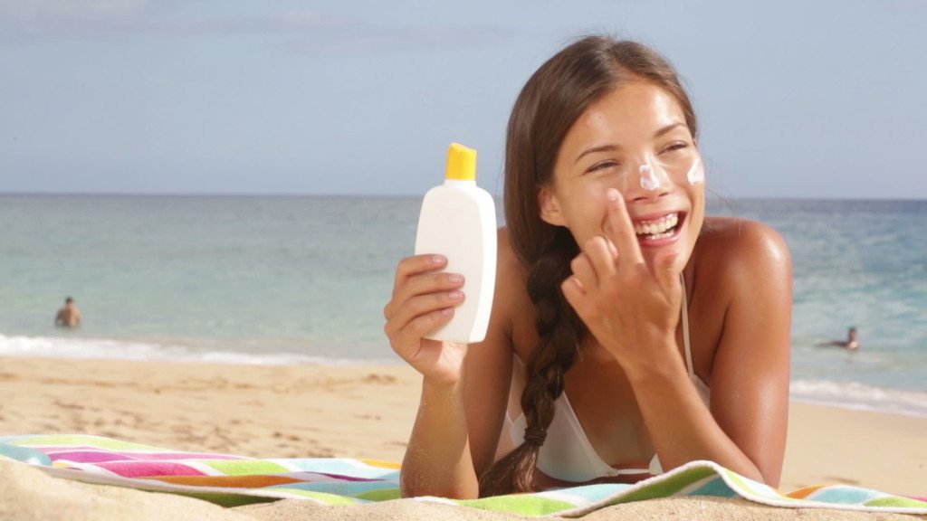 -sunscreen-woman-applying-suntan-lotion_galleryhip.com (1)