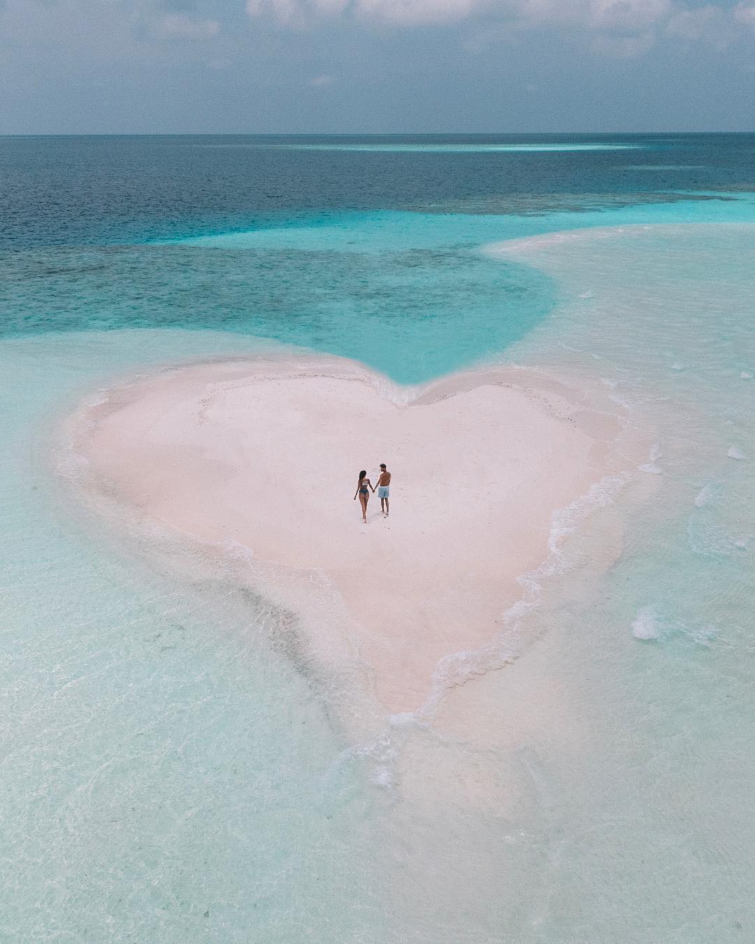 Pár na dovolenke na Maledivách